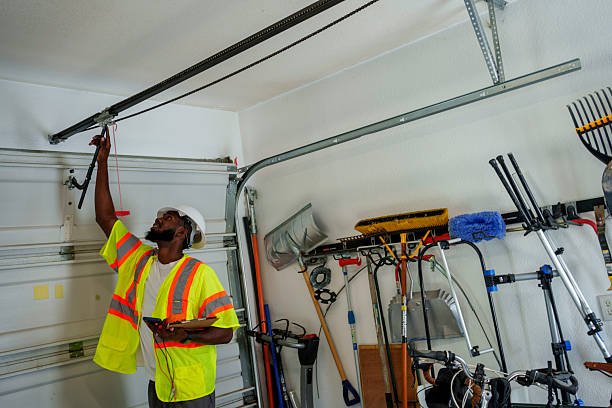 Professional Garage Door Panel Replacement technician working in Hancock County County, IL